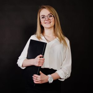 studio portrait of blonde businesswoman AHSAPV7